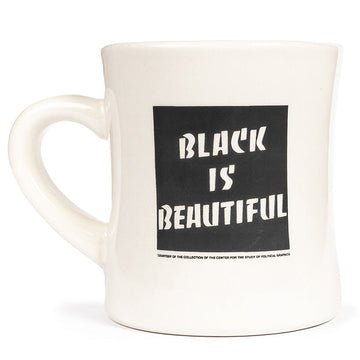 White mug with 'Black is Beautiful' text on a white background